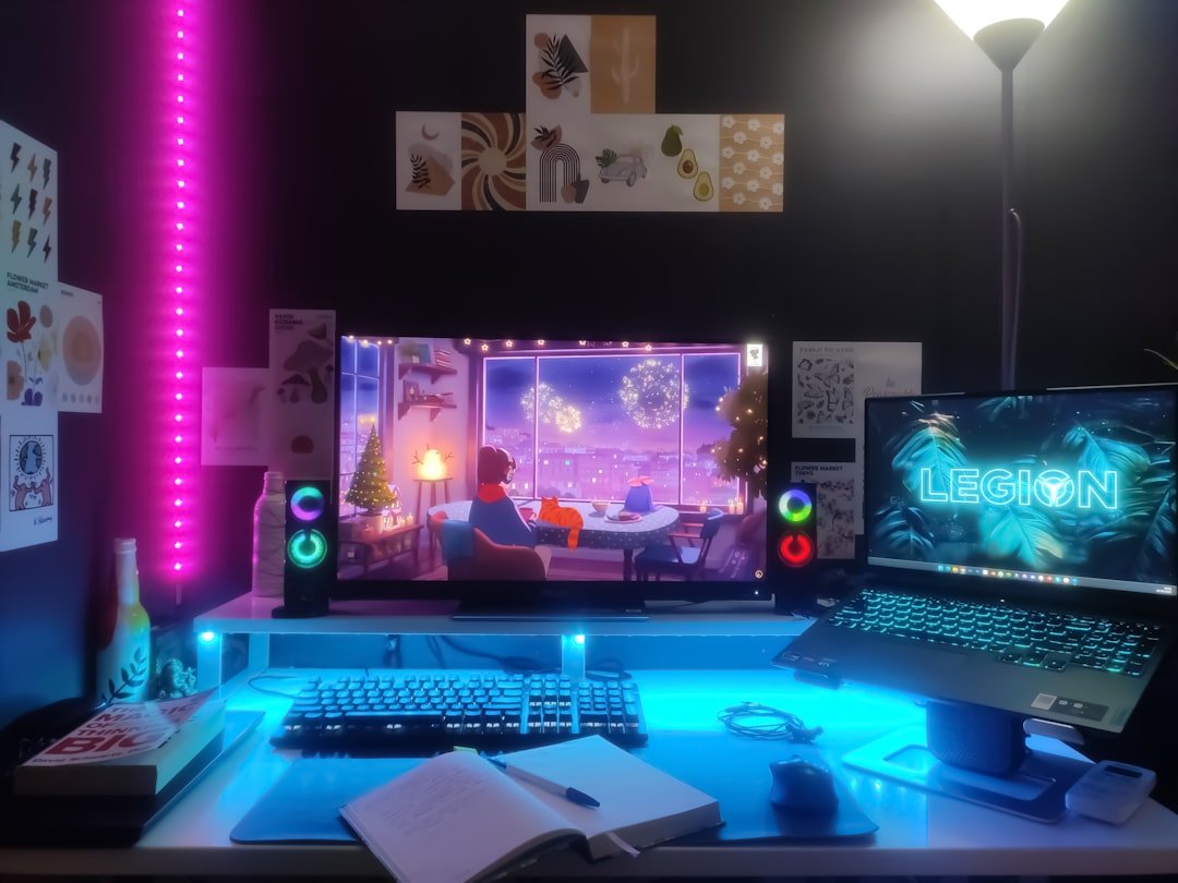 a-desk-with-a-laptop-and-a-monitor-on-it-0dujsq-idcc